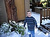44. Kenan checking out the snow fall from the trees.jpg