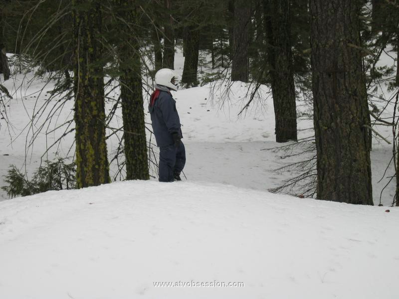 17. Chad checks out the trucks coming up the hill..jpg