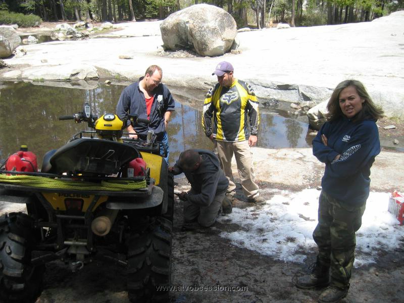 059. I pinched a nice hole in my 6 ply sidewall...Jack tries to plug it..jpg