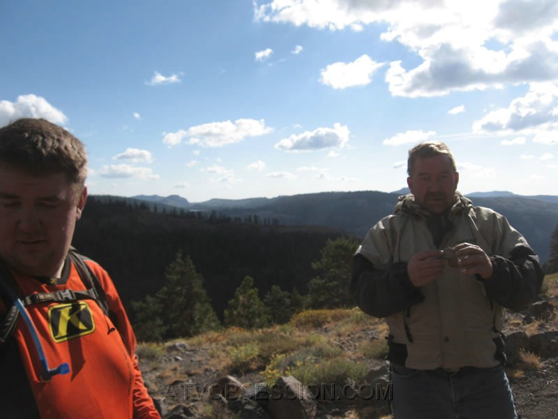 42. Bill checks out rocks, with Meadow Lake in the background..jpg