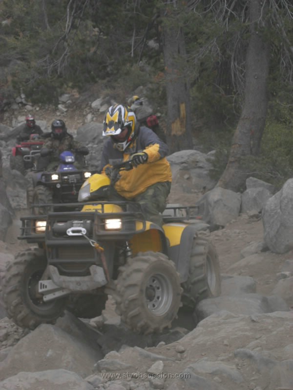 079. Ken cranks the wheel..jpg