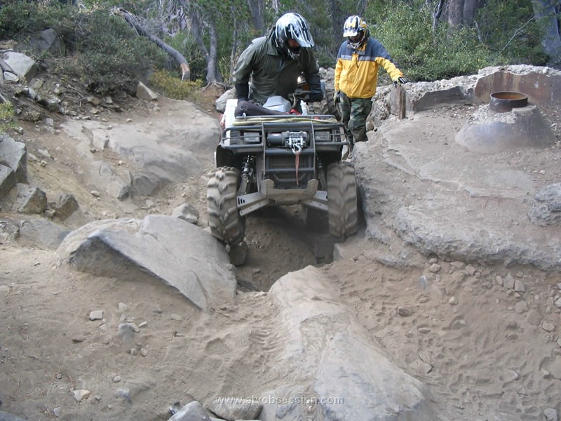 088. Ken spots Thomas headed back through the mining equipment..jpg