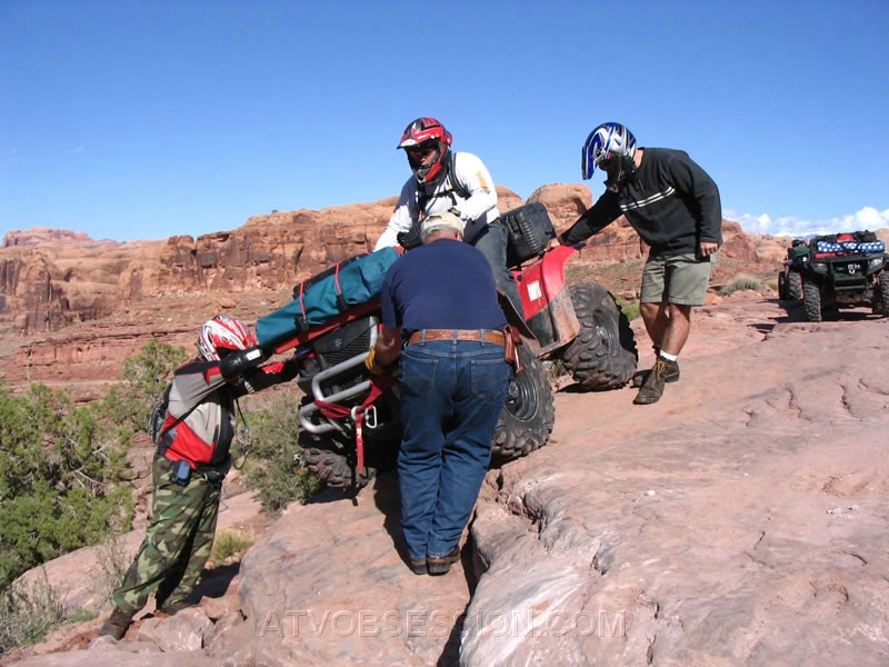 208. Larry's turn...Ken pushes, while Steve and Dusty hold him down..jpg