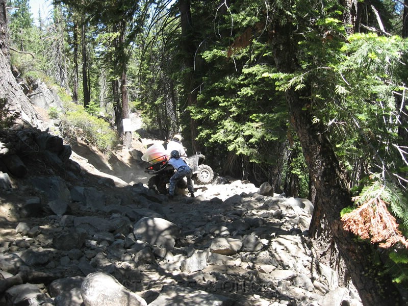 160. Lori gives her quad a shove..jpg