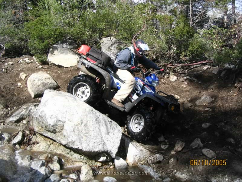 15. Logan heads over the same boulder..jpg