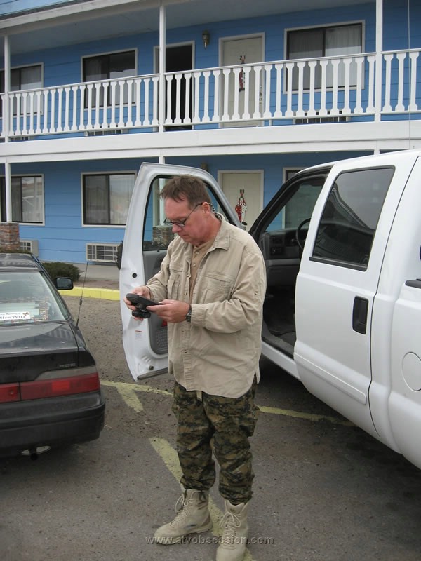 017. Brad, the trail mad scientist, makes some final calcuations..jpg