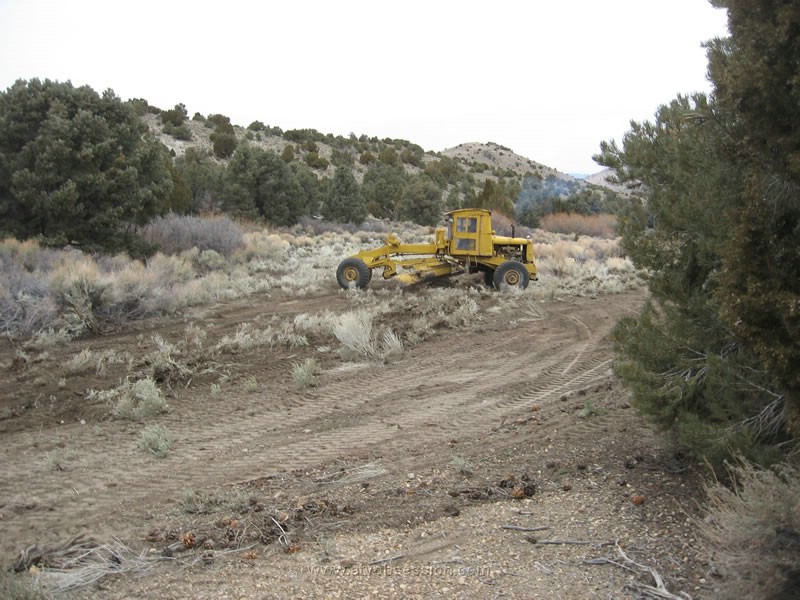 201. While looking for the farm, we found this guy scraping the desert...and ATV's get a bad name..jeesh..jpg